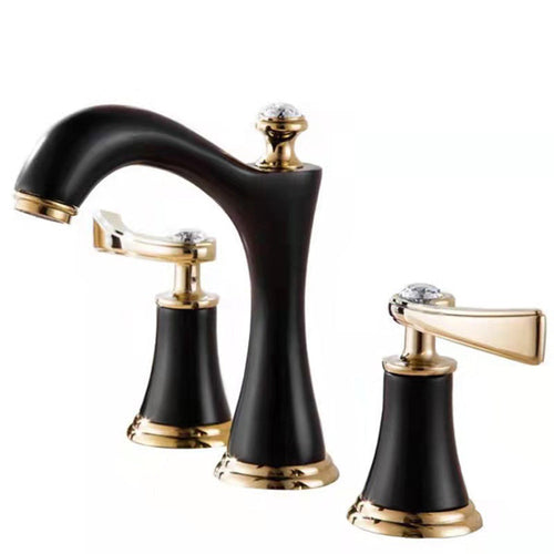 Black and gold brass three-hole basin tap with curved spout and two handles