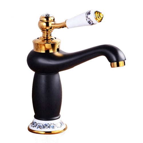 Black and gold traditional basin tap in the low height configuration