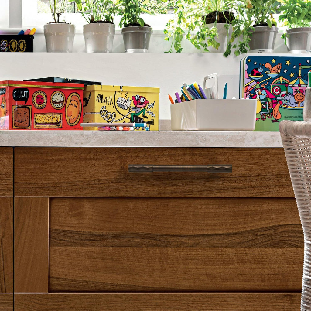 Art Deco brass cabinet handles and knobs installed on cabinets and drawers