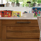 Art Deco brass cabinet handles and knobs installed on cabinets and drawers