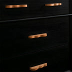 Wavy wood cabinet handle light wood handles fitted to black drawers