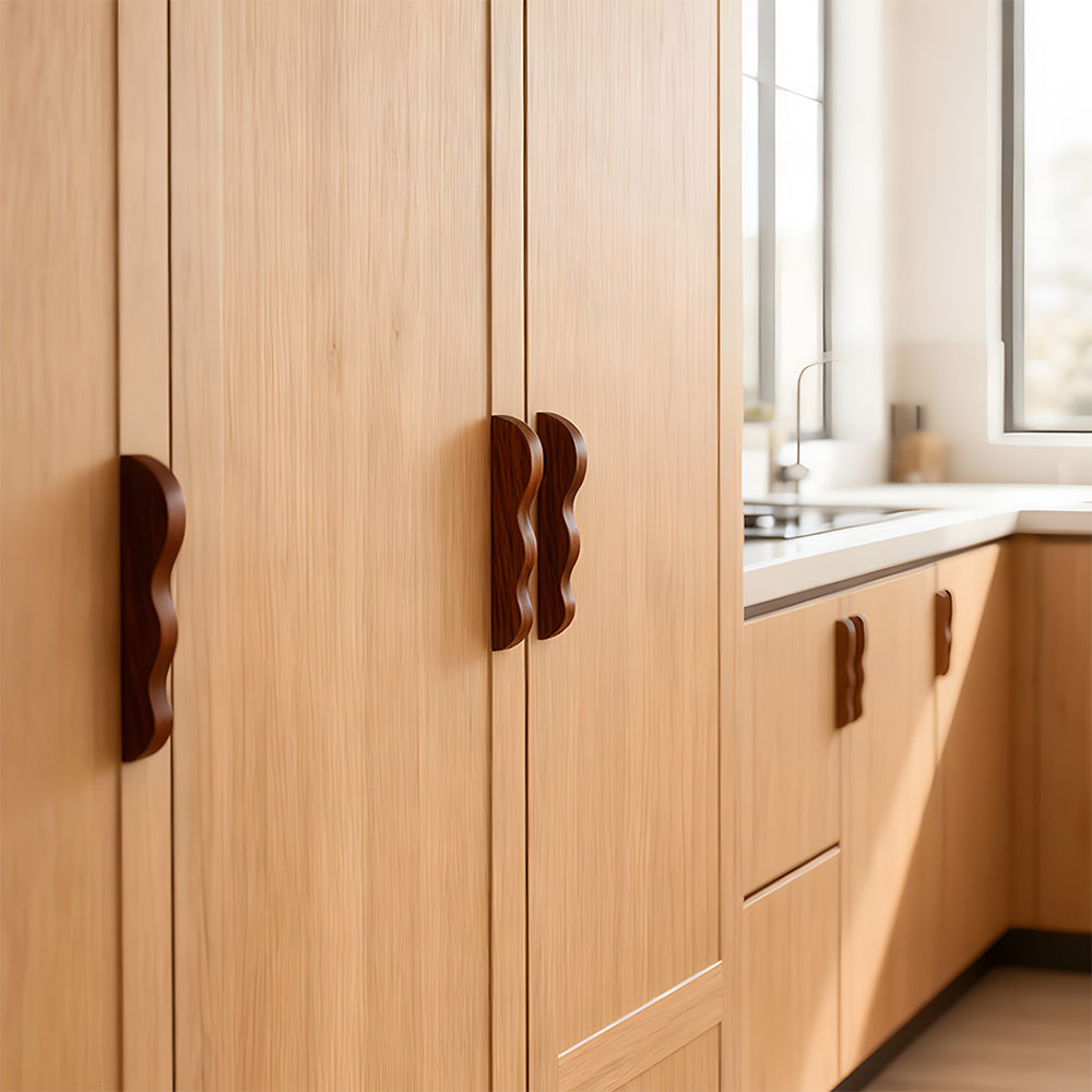 Wavy wood cabinet handle dark wavy pulls on a wood wardrobe
