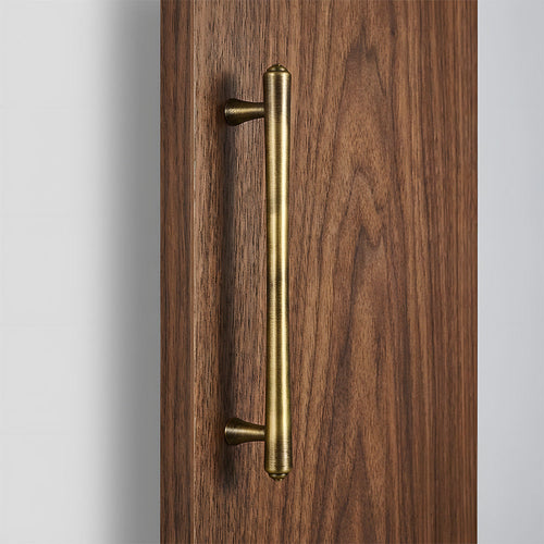 Antique bronze brass cupboard and drawer pulls installed on cupboards and drawers