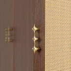 Star-shaped brass cabinet hardware antique bronze handle shown at an angle
